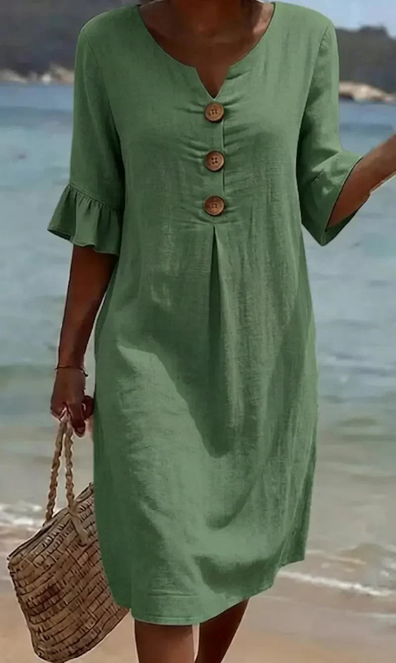 Vanesa | Textured dress with puff sleeves and buttons