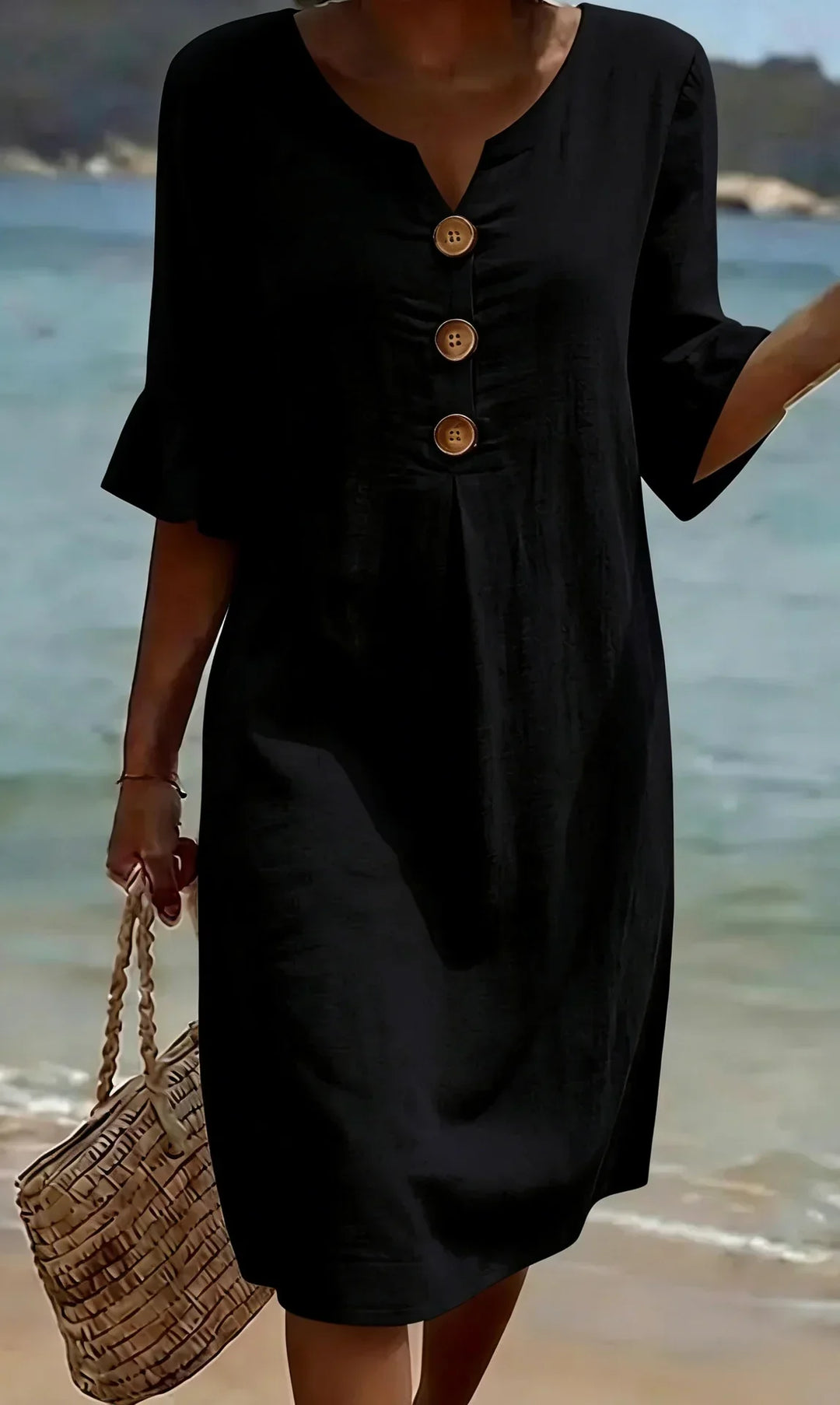 Vanesa | Textured dress with puff sleeves and buttons